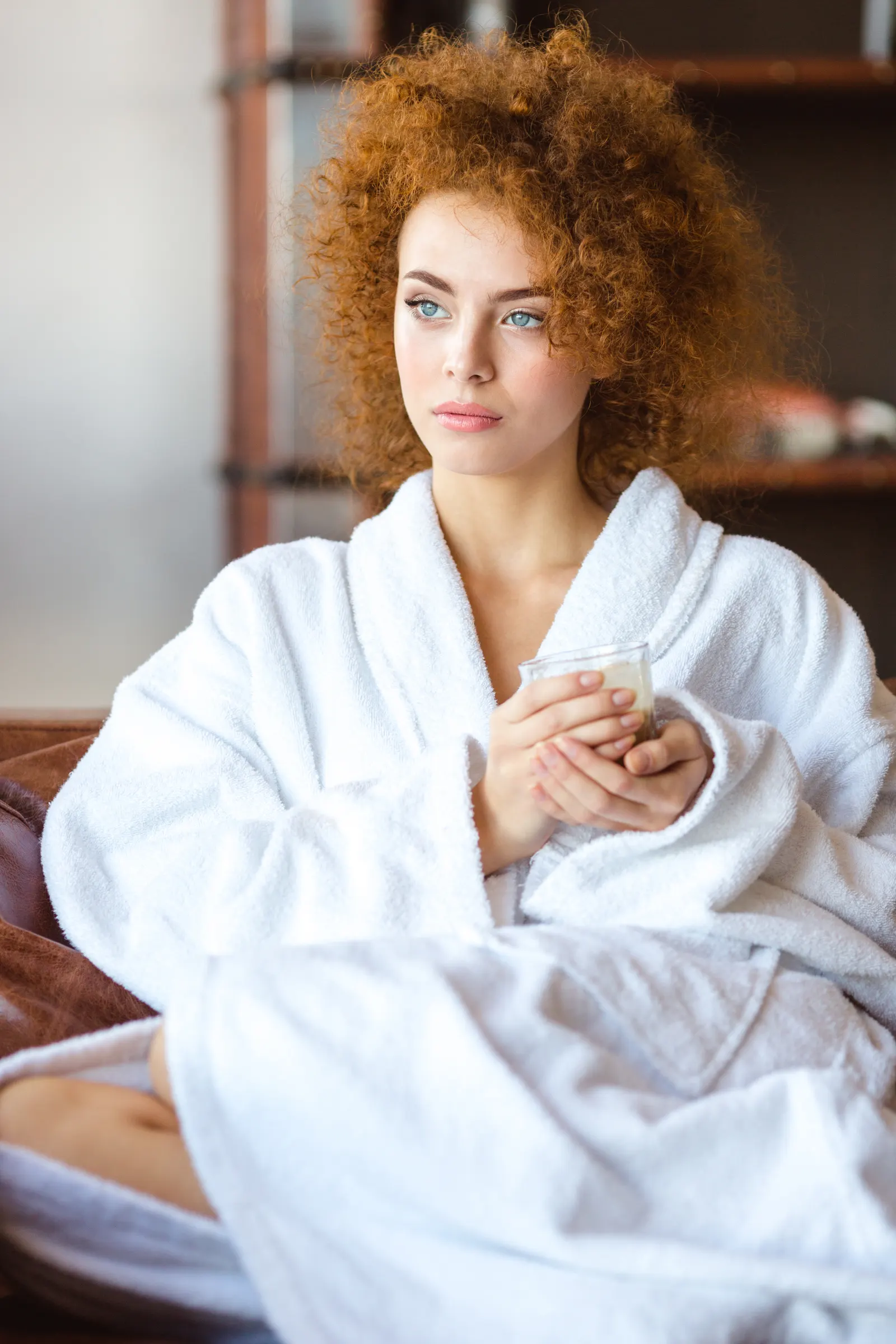 Waiting calmly in a robe before a consultation