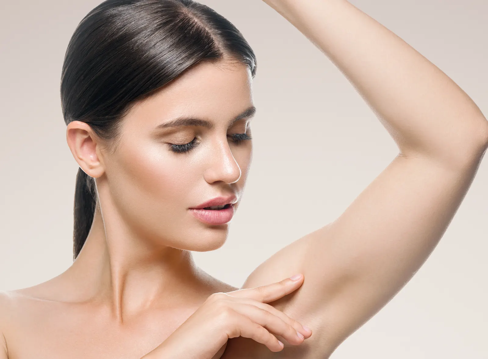 Woman with smooth arm skin in warm natural light