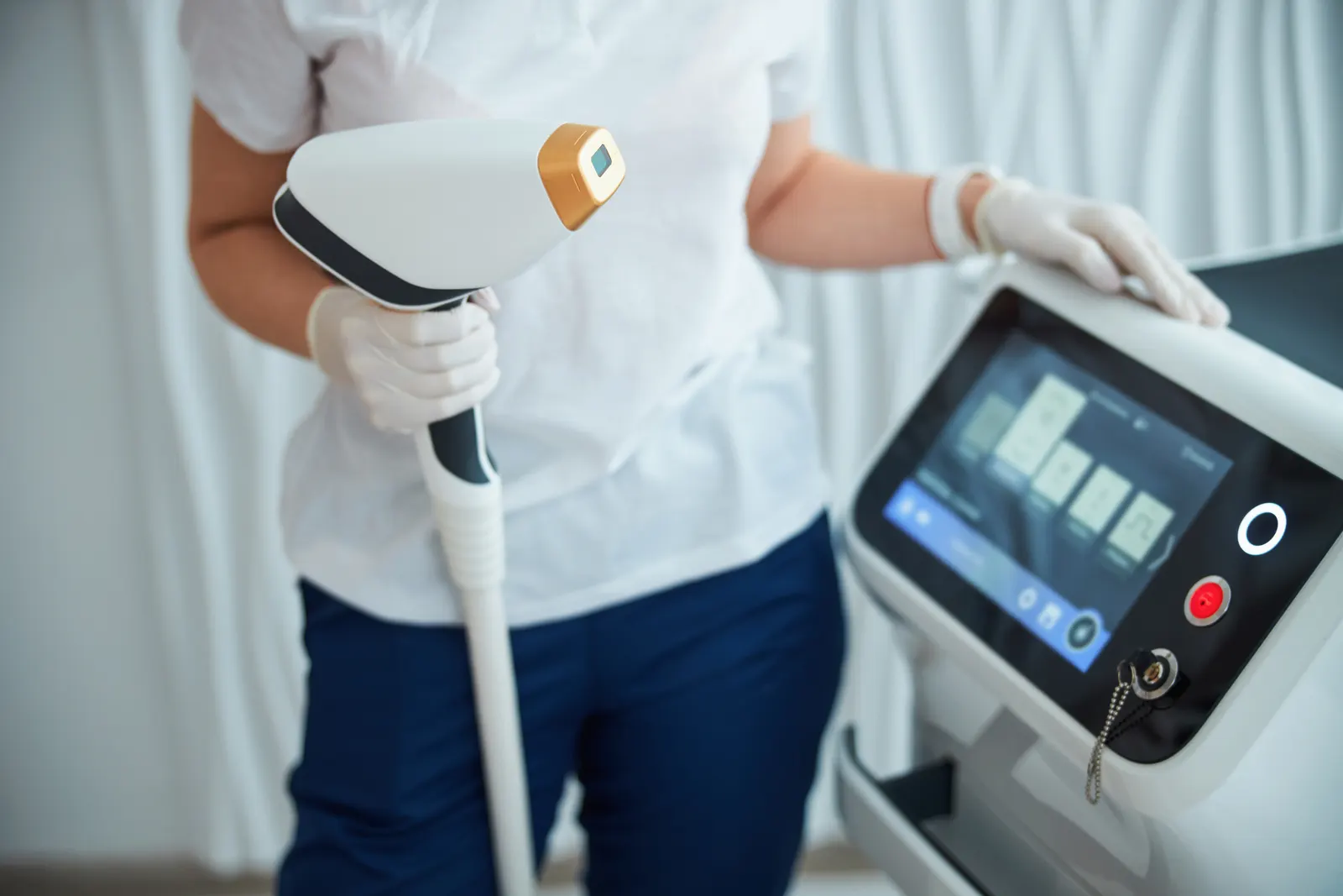 Laser hair removal handpiece and its control unit in a clinical treatment room