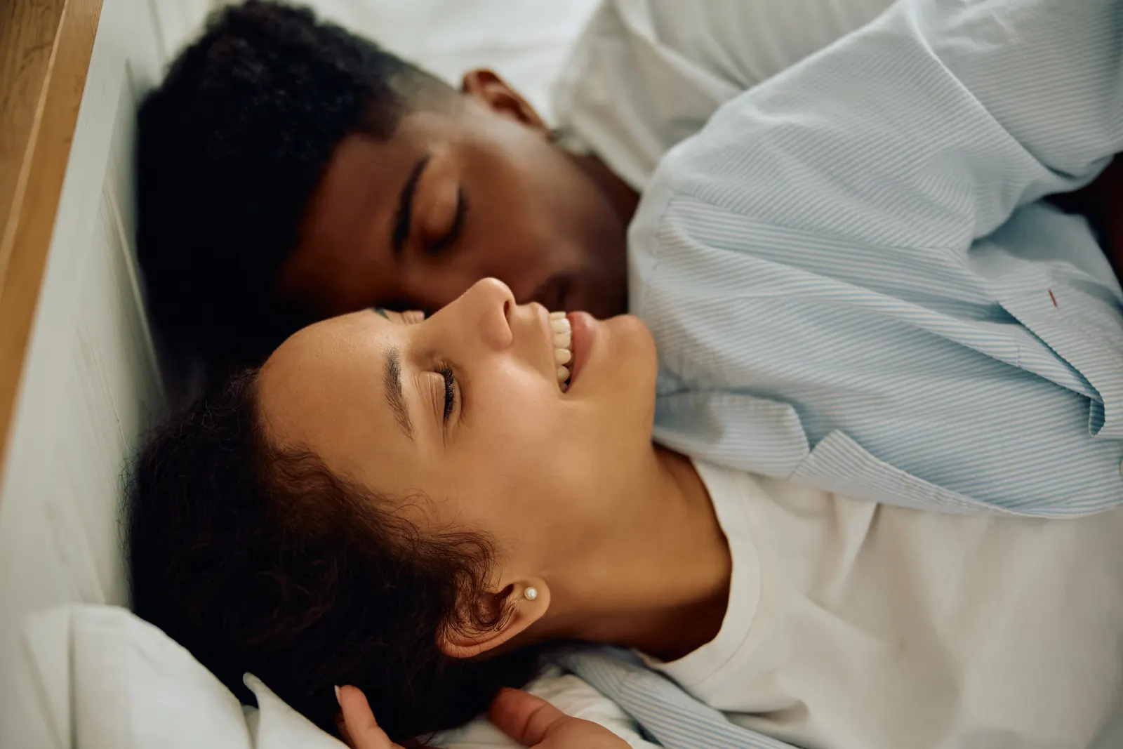 Person sleeping peacefully in soft morning light